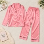 Pink silk night suit for women with button-front shirt and matching satin pajama