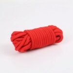 Red cotton bondage rope included in 10 piece BDSM kit