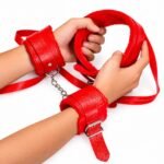 Red padded wrist restraints with soft inner lining for BDSM kit in Pakistan