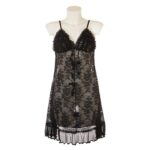 Classic black ruffled floral lace babydoll nighty dress with satin bows displayed on a mannequin. Shows sheer lace body and ruffled hemline.