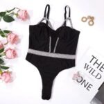 Black bodysuit lingerie with rhinestone straps and sparkle waistband