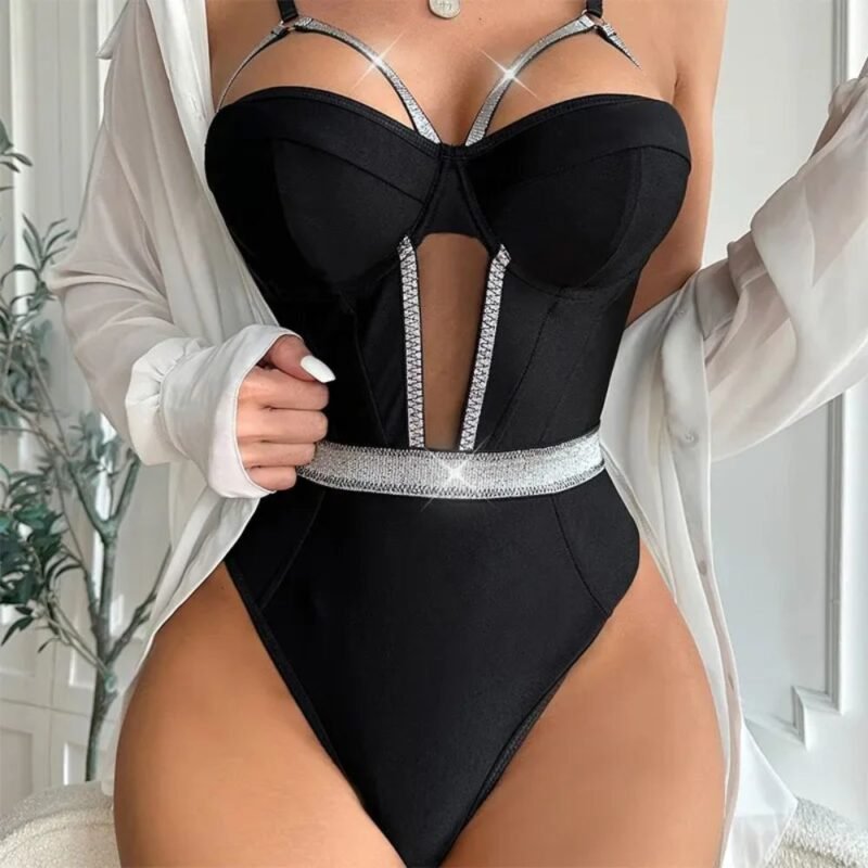 Black bodysuit lingerie with rhinestone trim and cutout waist