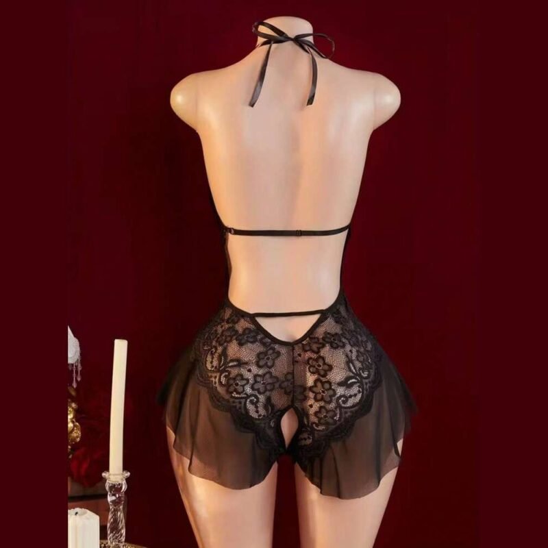 Back of a black lace teddy with a ribbon neck tie, slim horizontal straps, lower cutouts and mesh ruffles