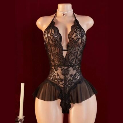 Black ruffle lace bodysuit on a mannequin, showing a deep V halter neckline and sheer hip frills