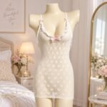 White heart body stocking displayed on mannequin with lace neckline and pink bow accents