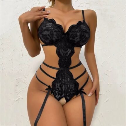 Black strappy bodysuit with embroidered lace and garter straps